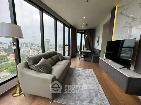 Modern living room with panoramic city view and stylish decor