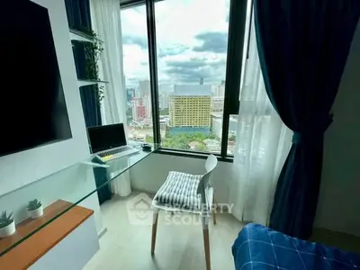 Modern study room with city view, glass desk, and cozy decor