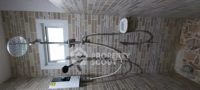 Modern bathroom with dual shower heads and stylish tile design