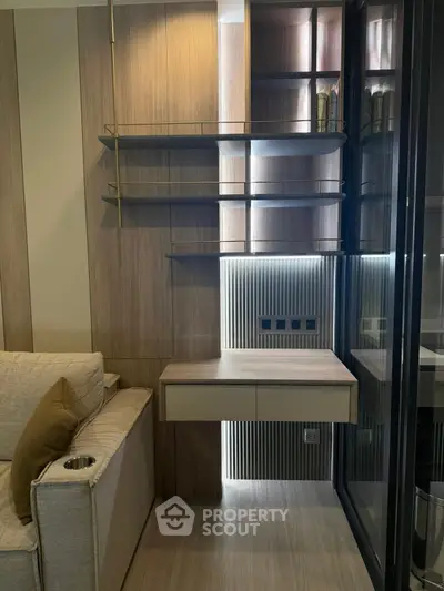 Modern living room with sleek wooden shelves and cozy sofa