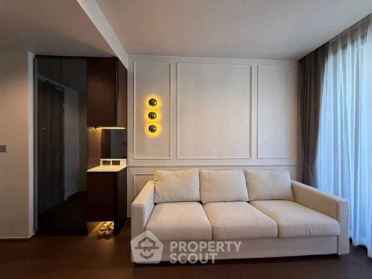 Modern living room with elegant sofa and stylish lighting