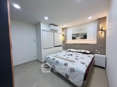 Modern bedroom with stylish decor and cozy ambiance