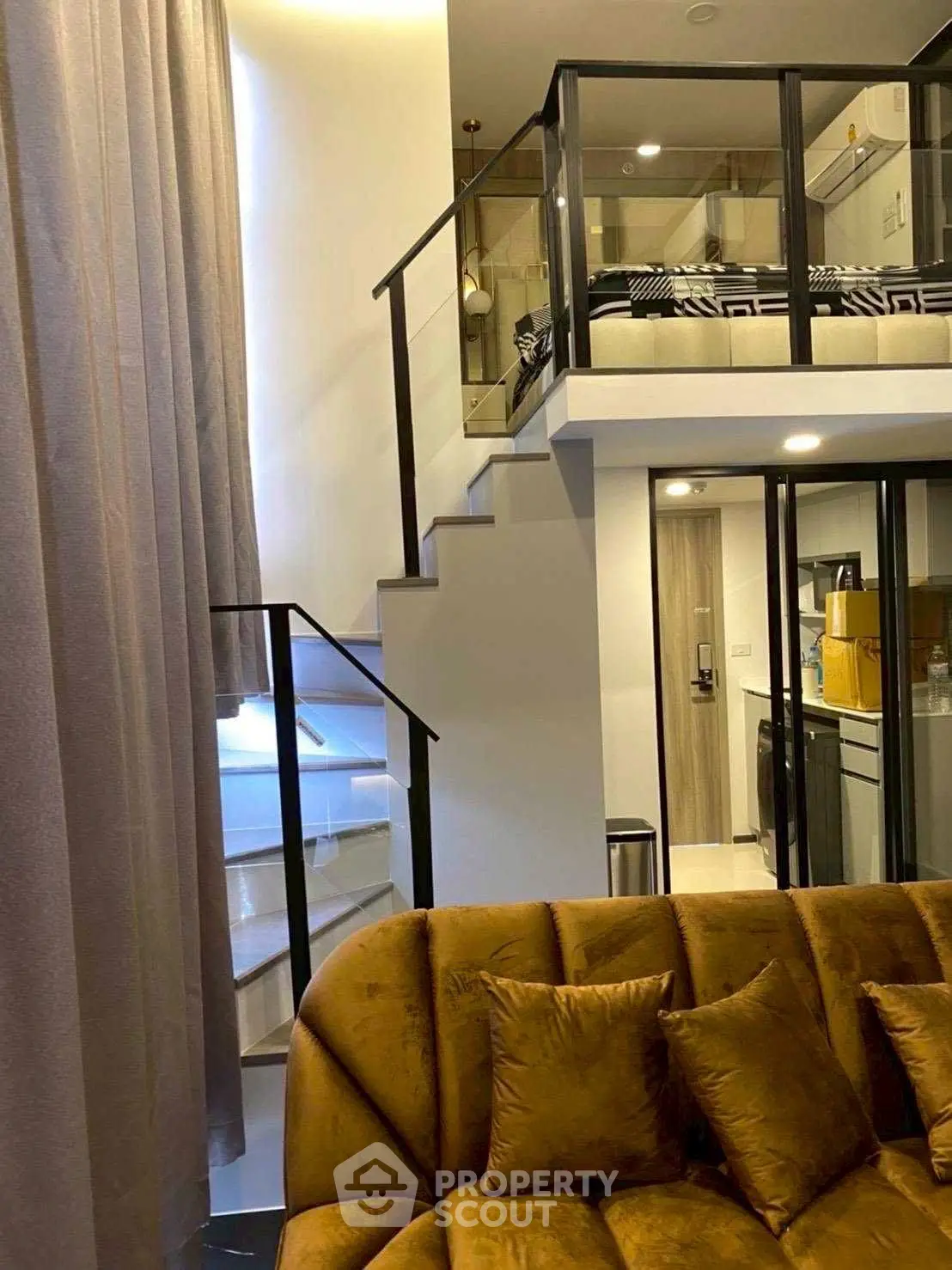 Modern loft apartment with stylish mezzanine and cozy living area
