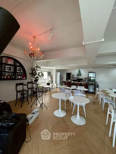 Spacious modern living room with elegant decor and wooden flooring