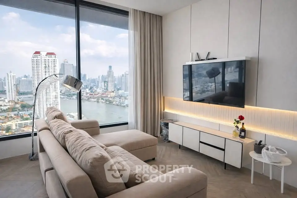 Luxurious living room with stunning city skyline view, modern decor, and elegant furnishings.