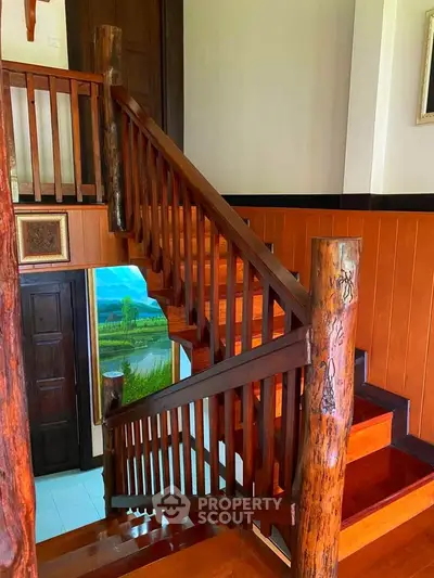 Elegant wooden staircase with rustic charm in a cozy home interior