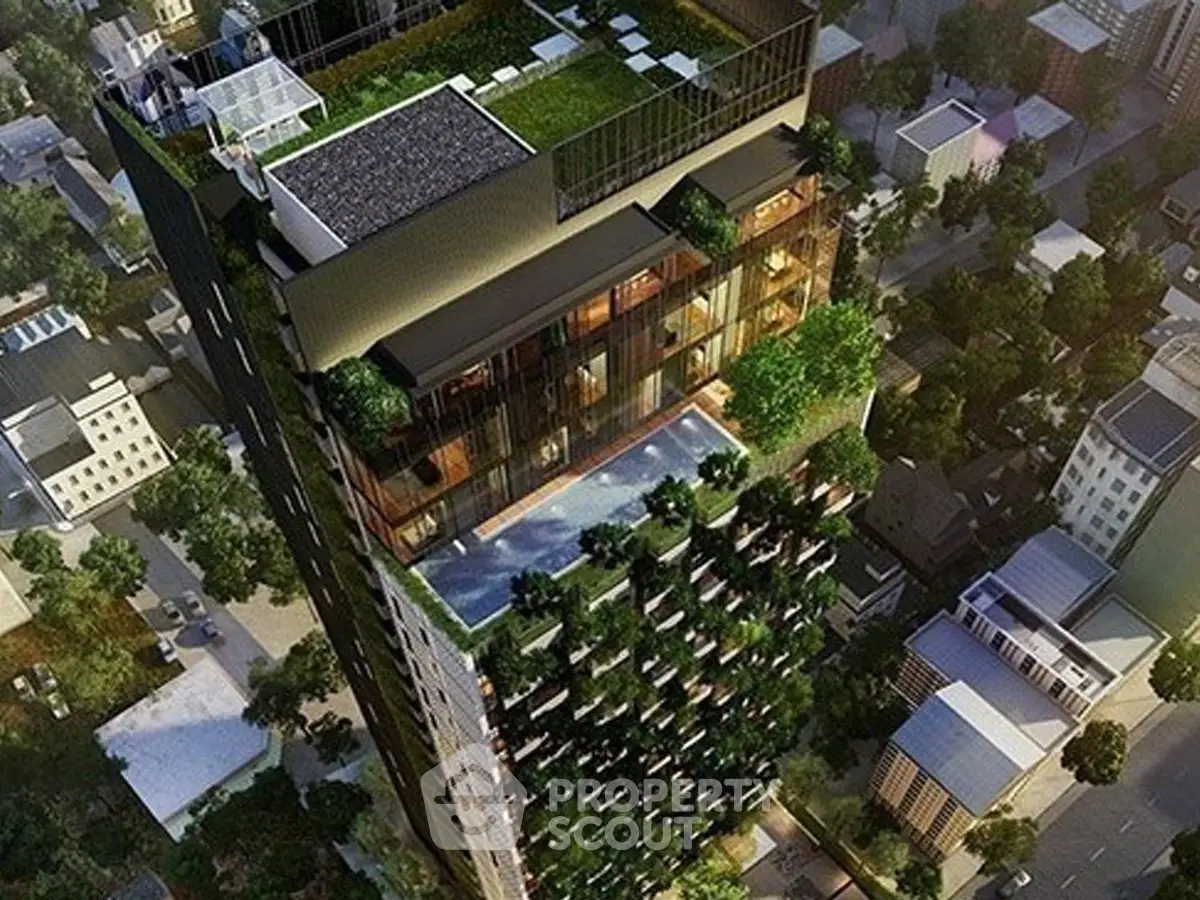 Stunning aerial view of a modern high-rise building with lush greenery and rooftop pool.