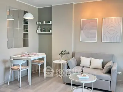 Chic modern living room with cozy sofa, stylish dining area, and elegant decor in neutral tones.