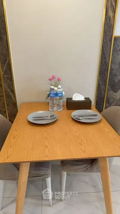 Elegant dining area with modern table setting and chic decor