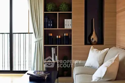 Elegant living room with modern decor and balcony view