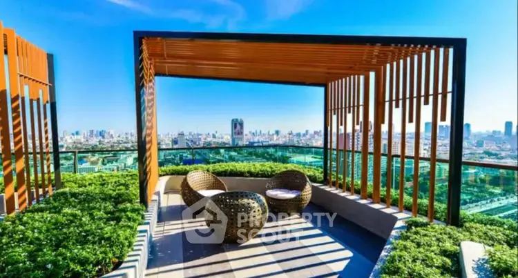 Stunning rooftop terrace with panoramic city views and modern seating area.