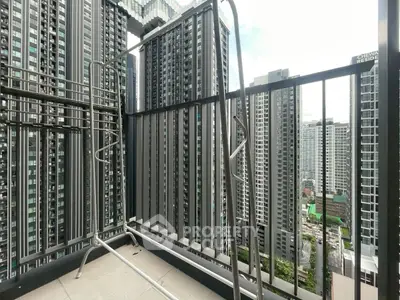 High-rise balcony with stunning cityscape views of modern skyscrapers.
