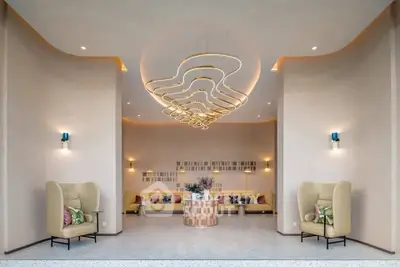 Luxurious modern living room with unique chandelier and stylish seating