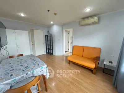 Cozy living room with modern furniture and wooden flooring