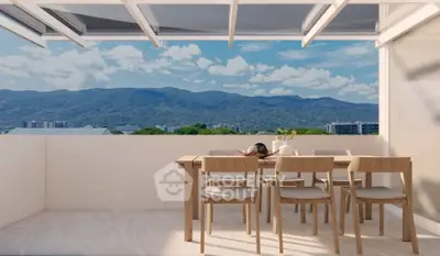 Stunning balcony with mountain views and modern outdoor dining set.
