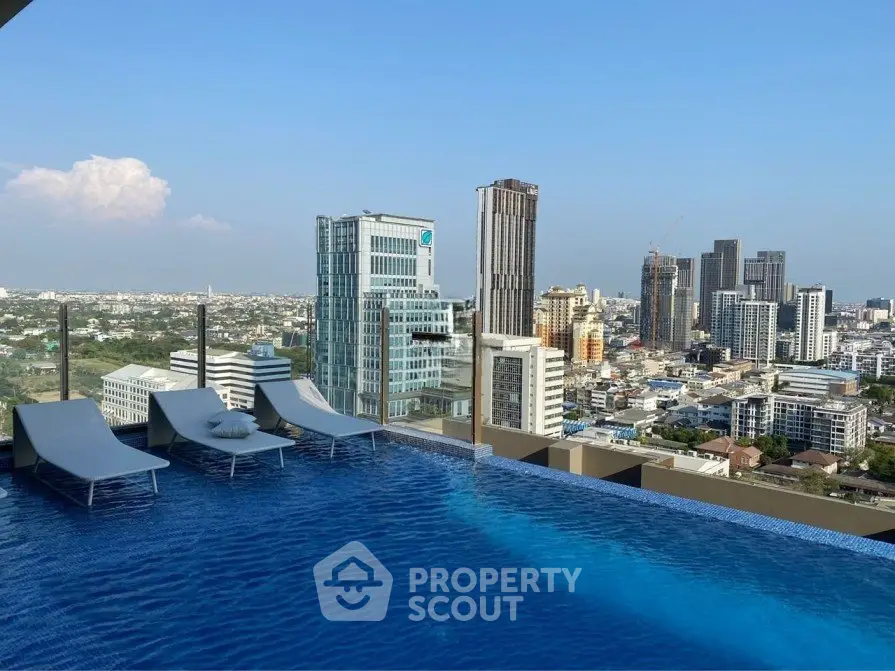 Stunning rooftop pool with panoramic city skyline view