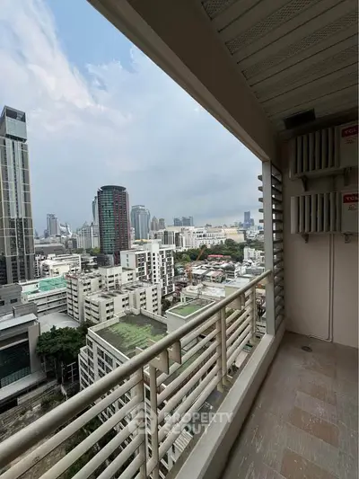 Stunning cityscape view from high-rise balcony in urban setting