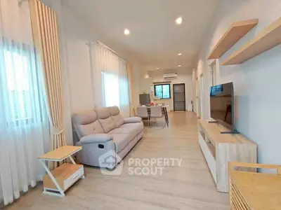 Spacious modern living room with stylish furniture and natural light