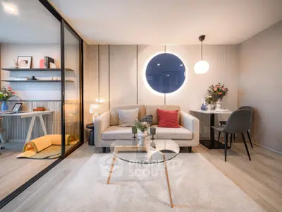 Modern living room with stylish decor and glass coffee table