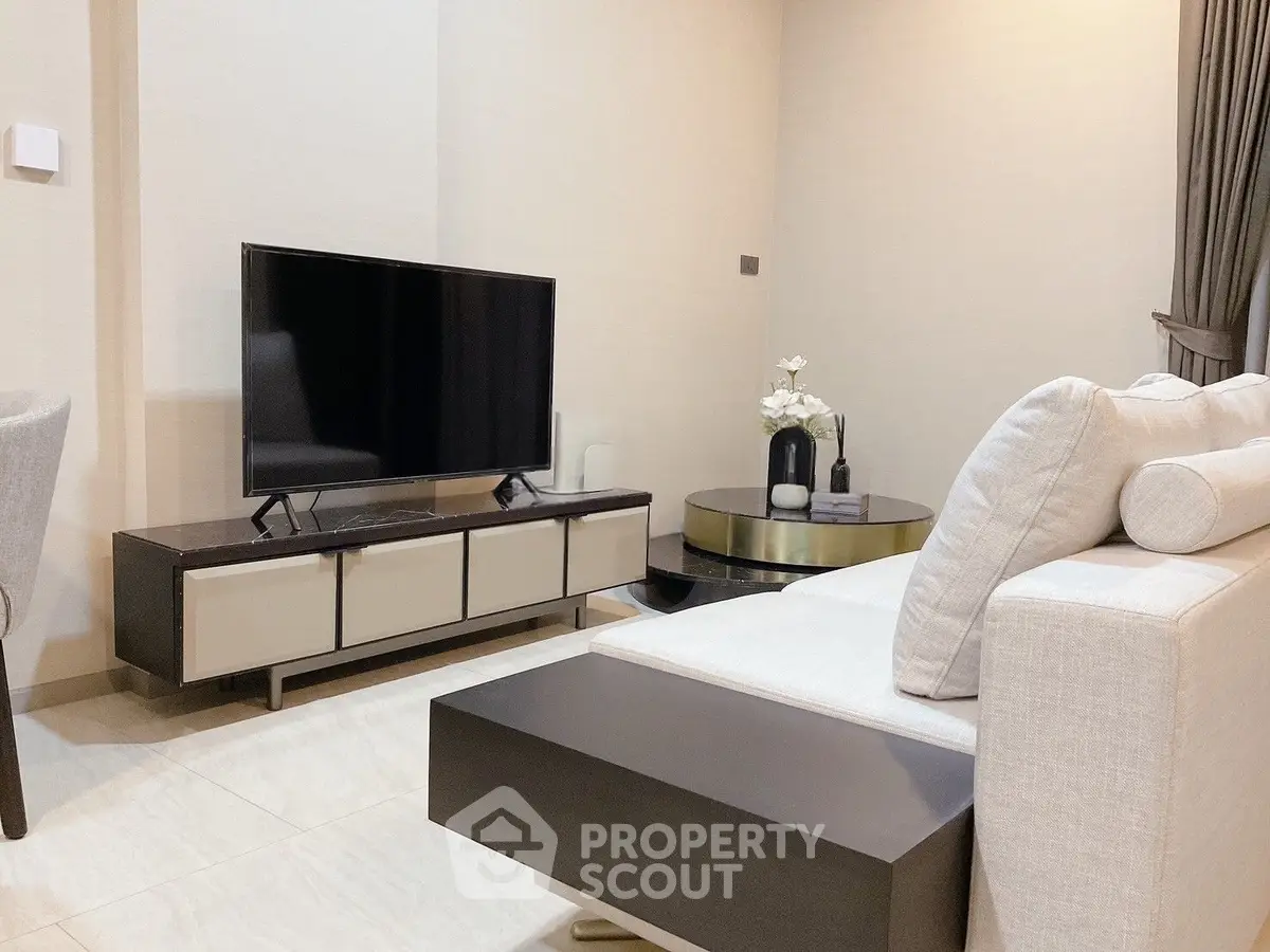 Modern living room with sleek TV stand and elegant decor