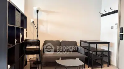 Cozy living room with modern furniture and stylish shelving unit