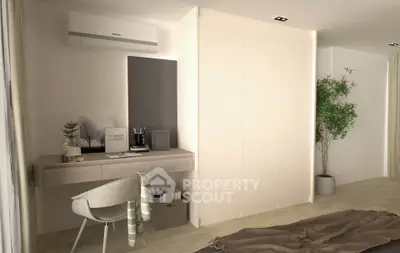 Modern bedroom with sleek desk, air conditioning, and stylish decor