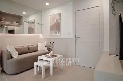 Modern living room with cozy sofa and stylish decor