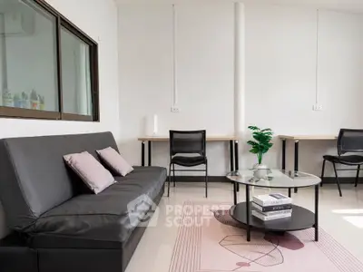 Modern living room with sleek furniture and stylish decor