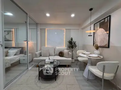 Modern living room with elegant decor and dining area in open layout apartment.