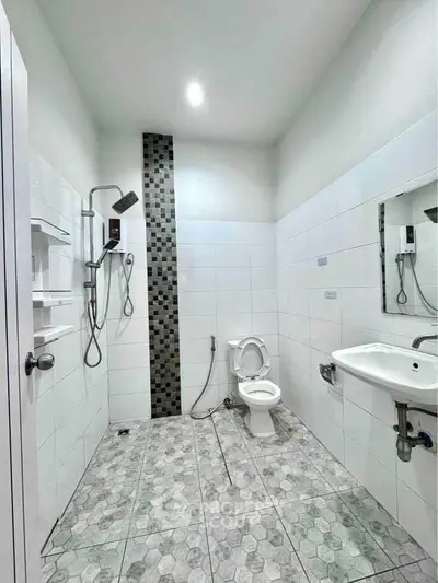 Modern bathroom with sleek shower and stylish tile design