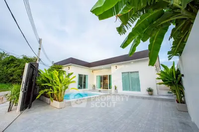 Stunning modern villa with private pool and lush garden, perfect for luxury living.