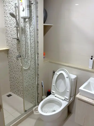 Modern bathroom with shower and toilet in sleek design