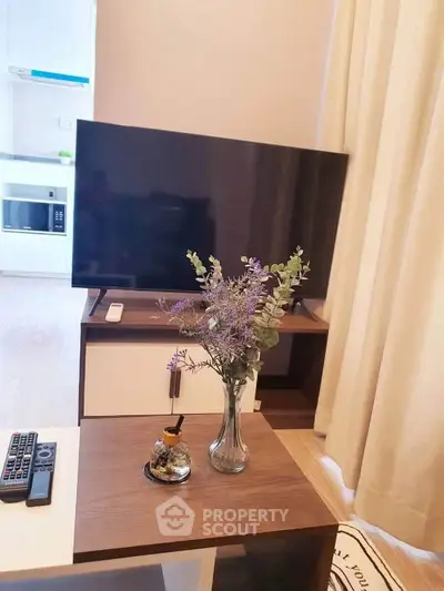 Modern living room with sleek TV setup and stylish decor