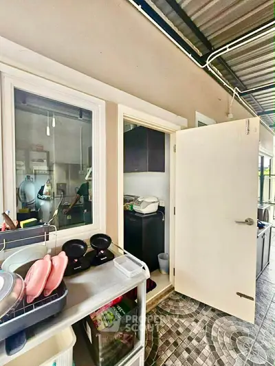 Charming kitchen area with modern appliances and open layout, perfect for culinary enthusiasts.