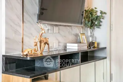 Modern living room with stylish decor and sleek marble TV stand