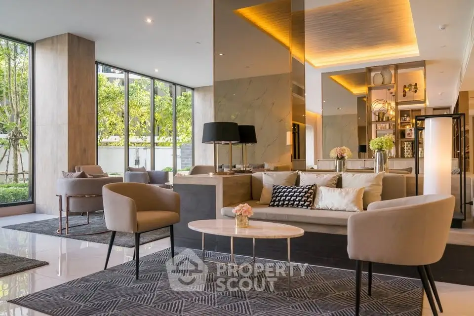 Luxurious modern living room with elegant decor and large windows