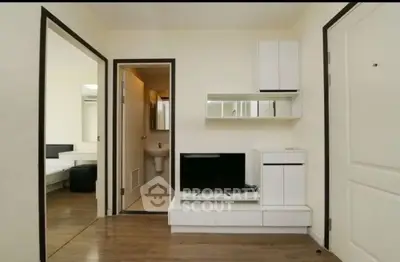 Modern apartment interior with sleek TV unit and minimalist design