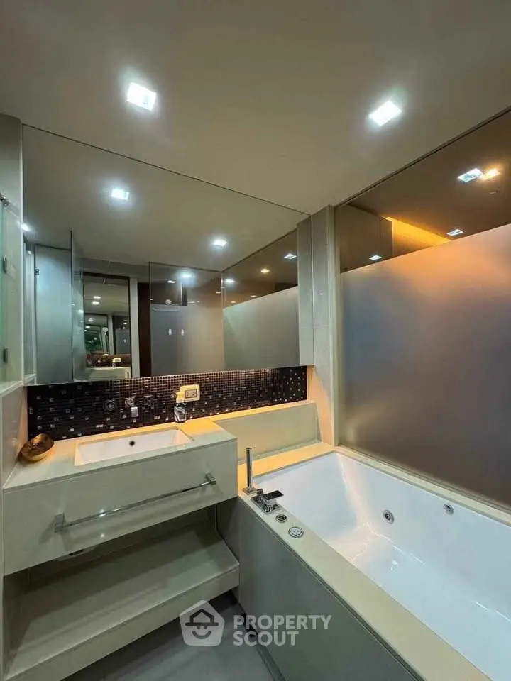 Modern bathroom with sleek design and luxurious bathtub