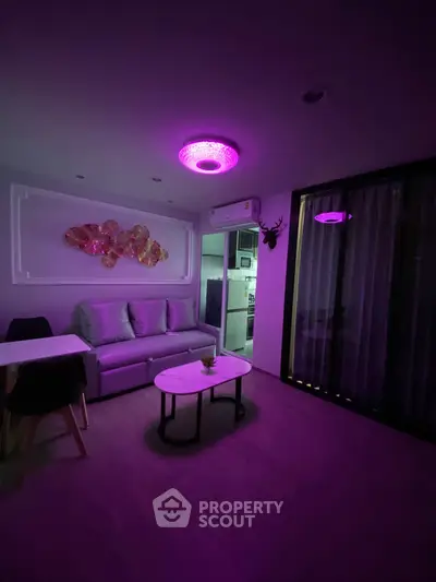 Modern living room with ambient purple lighting and stylish decor