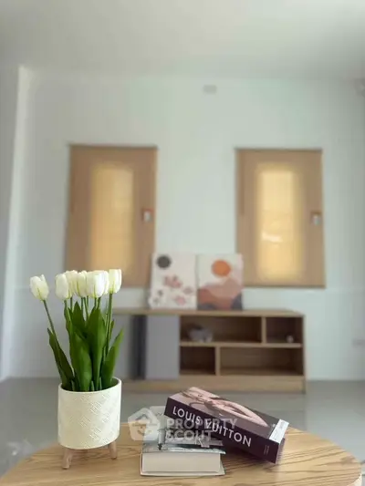 Stylish living room with modern decor and elegant furniture, perfect for contemporary living.