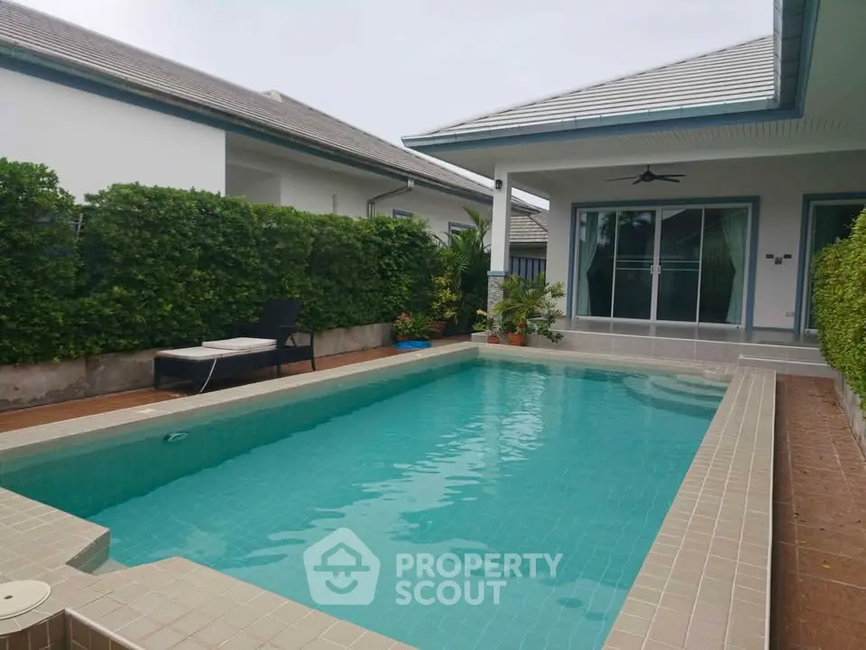 Charming villa with private pool and lush greenery, perfect for relaxation and luxury living.