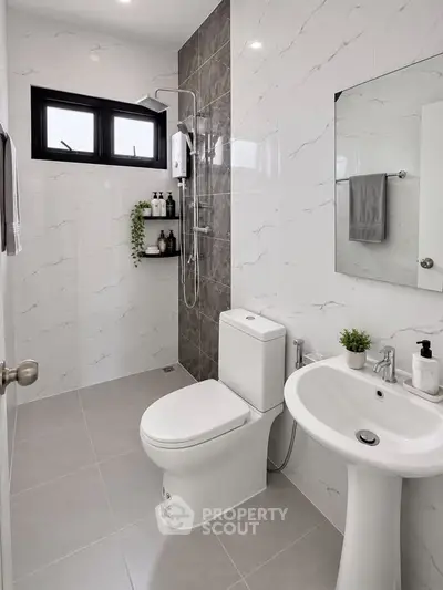 Modern bathroom with sleek fixtures and elegant tile design