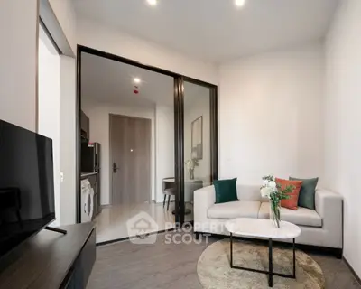 Modern living room with sleek furniture and open layout