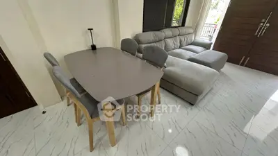 Modern living room with stylish furniture and natural light