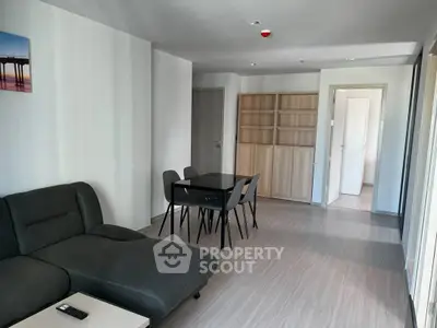 Modern living room with sleek furniture and open layout, perfect for contemporary living.