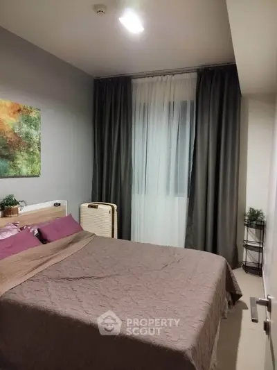 Cozy bedroom with modern decor and natural light