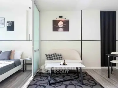 Modern living room with stylish decor and cozy seating area, perfect for relaxation and comfort.