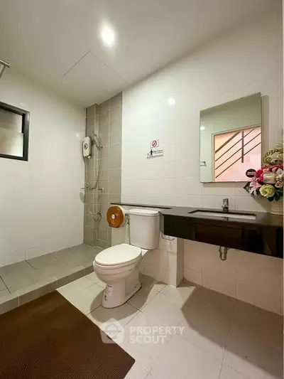 Modern bathroom with sleek fixtures and a spacious layout