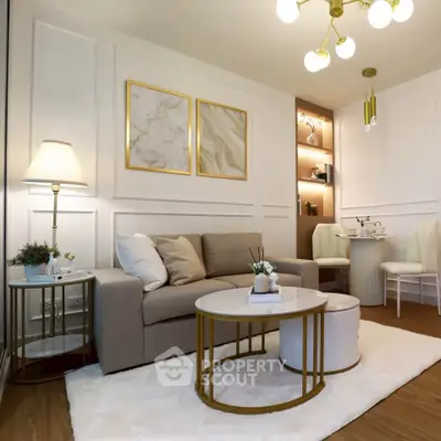 Elegant living room with modern decor, cozy seating, and stylish lighting in a chic apartment.