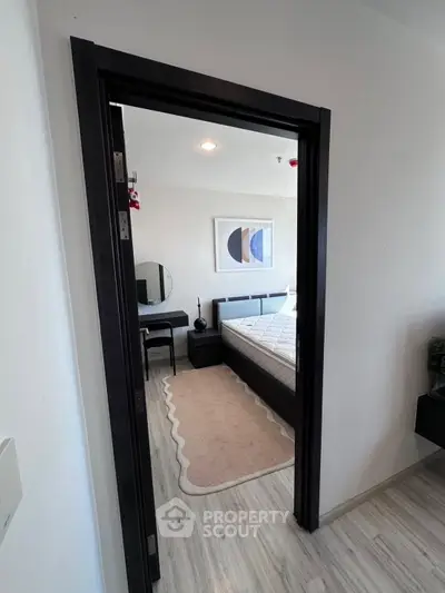 Modern bedroom with stylish decor and natural light